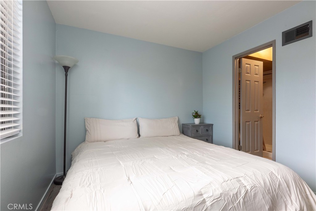 3342 Bradbury Road, Unit 9 Los Alamitos, CA 90720 - Photo 7 of 45 Downstairs primary bed with access to en suite bathroom