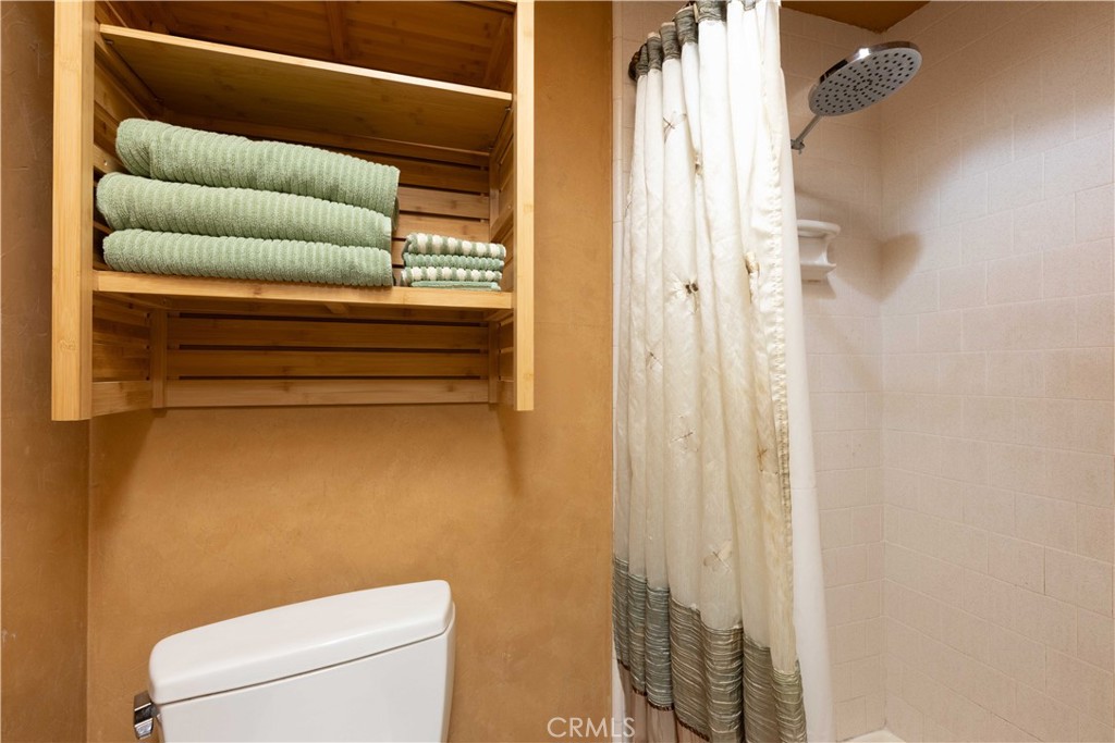 3342 Bradbury Road, Unit 9 Los Alamitos, CA 90720 - Photo 9 of 45 Downstairs 3/4 bath has shower