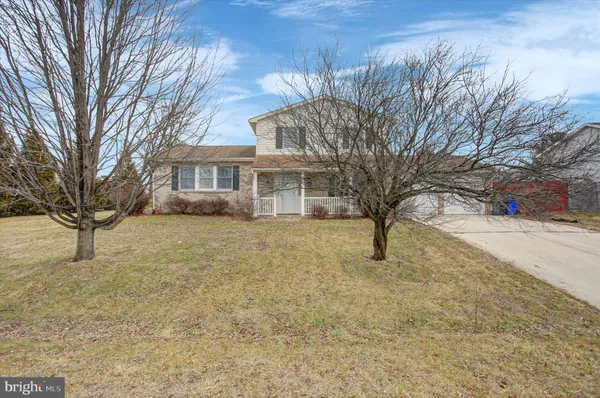 a house with trees in front of it
