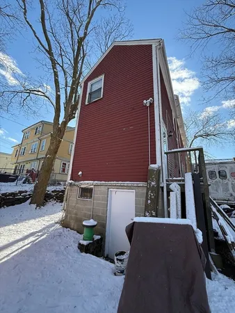 a view of backyard with seating space