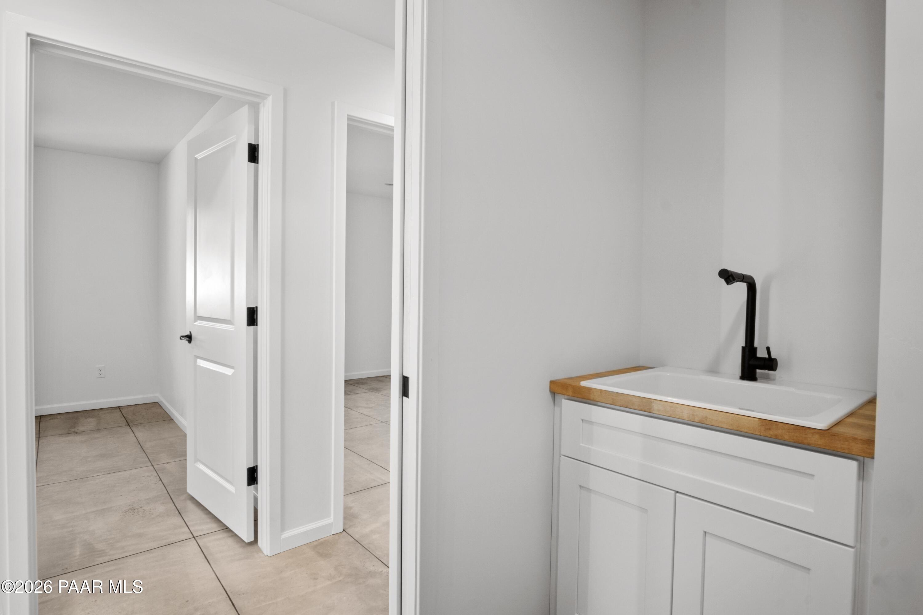 4920 East Amber Road Prescott, AZ 86301 - Photo 33 of 38 a view of a bathroom with a sink