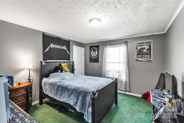 a bathroom with a sink and mirror with toilet