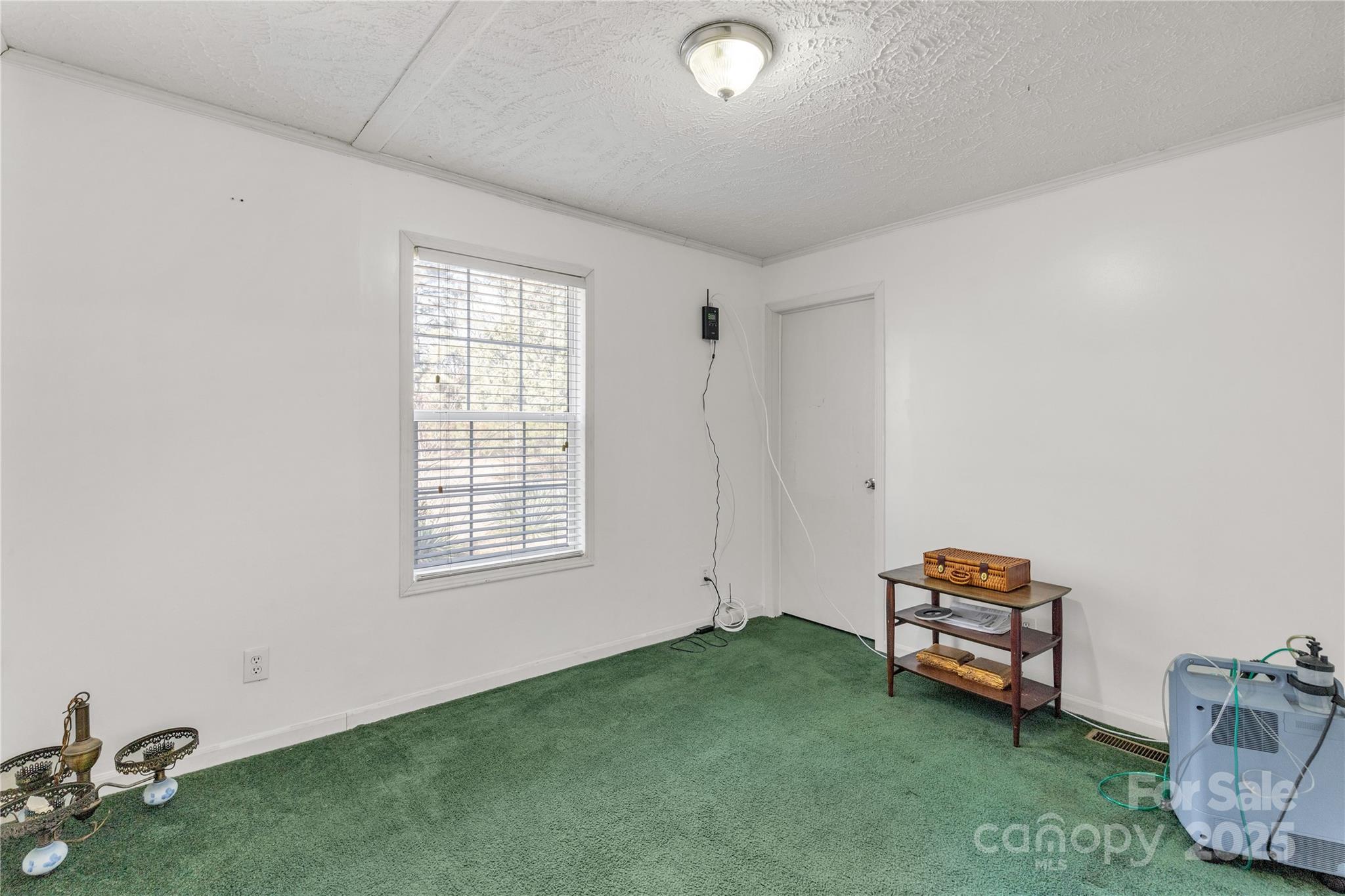928 Neds Creek Road Kershaw, SC 29067 - Photo 24 of 38 a room with a bed and a window