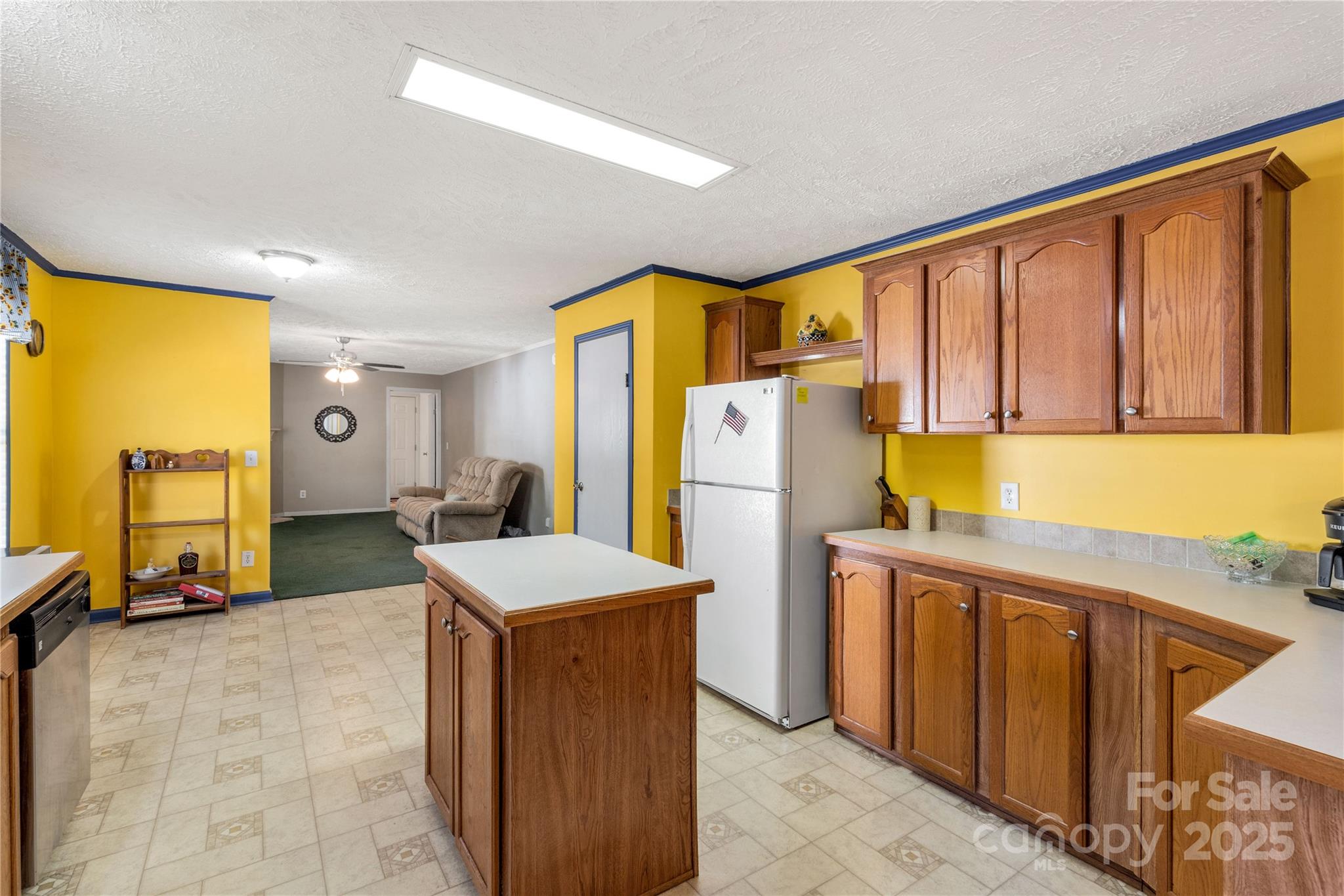 928 Neds Creek Road Kershaw, SC 29067 - Photo 9 of 38 a bedroom with a bed a table and large windows