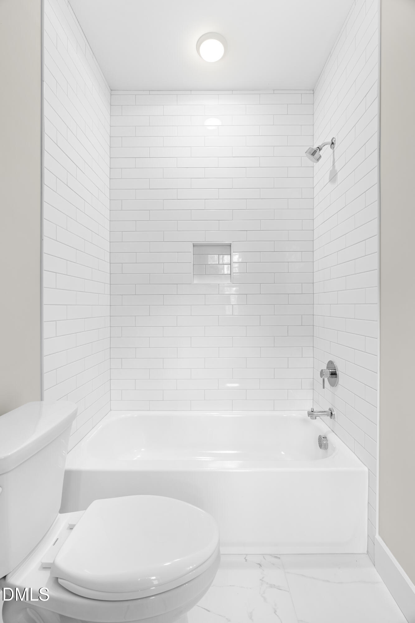 1028 Harper Road Raleigh, NC 27603 - Photo 25 of 50 a white bath tub sitting next to a white toilet