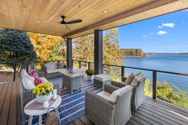 516 Hillandale Road Seneca, SC 29672 - Photo 34 of 50 An inviting outdoor living space with breathtaking water views, ideal for relaxation and entertaining.