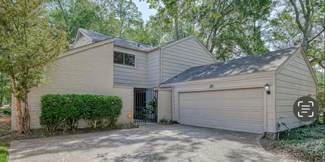 a view of a house with a garage
