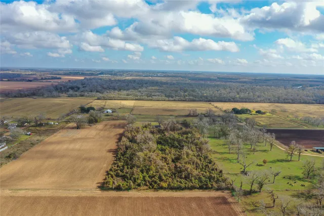 a view of lake with green space