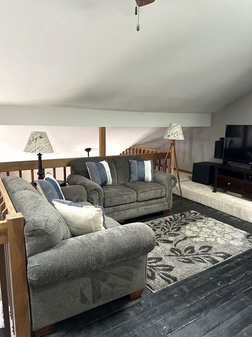 16806 82nd Avenue, Unit 3S Tinley Park, IL 60477 - Photo 13 of 14 a living room with furniture and a flat screen tv