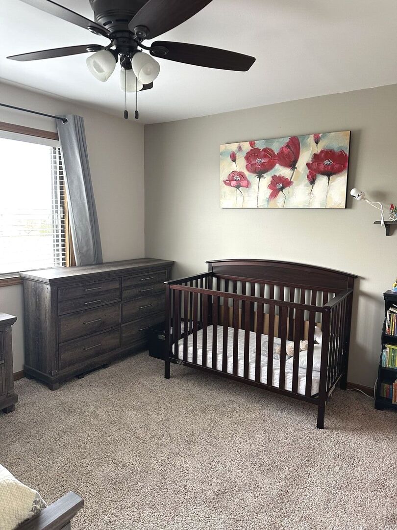 16806 82nd Avenue, Unit 3S Tinley Park, IL 60477 - Photo 10 of 14 a bedroom with furniture and a window