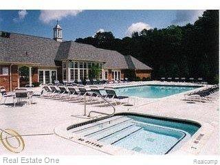 3521 Oakmonte Boulevard, Unit 74 Rochester, MI 48306 - Photo 25 of 31 Pool and Hot Tub