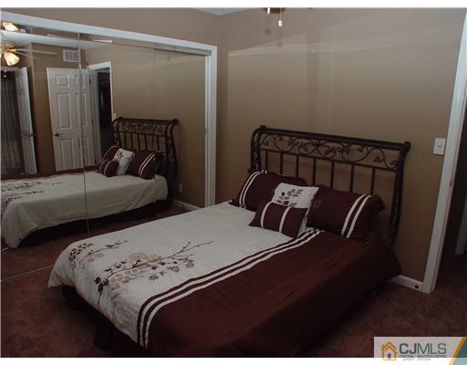 80 Old Road Princeton, NJ 08540 - Photo 8 of 16 a bedroom with two beds and a mirror