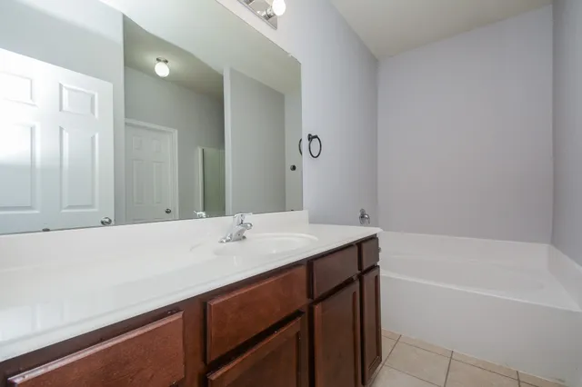a bathroom with a sink and a bathtub