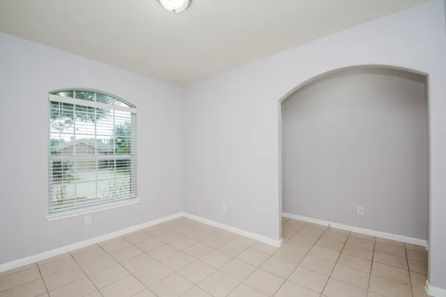 an empty room with windows