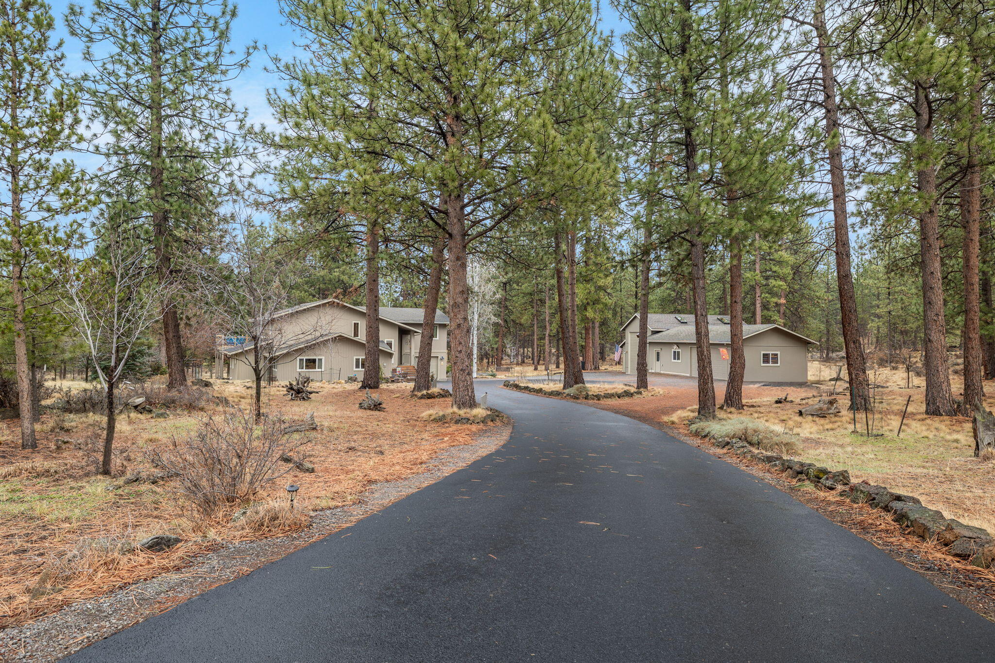 60290 Woodside Loop Bend, OR 97702 - Photo 35 of 47 New wide driveway with sealed asphalt from street to landing