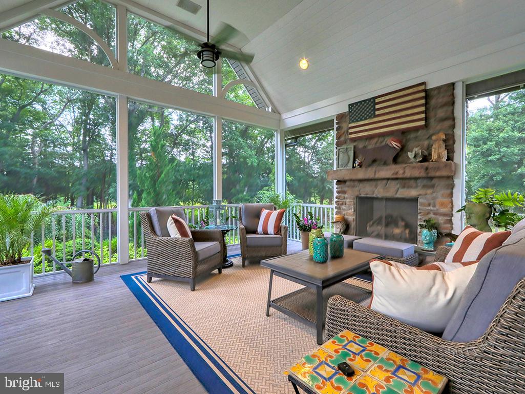 35975 Goshawk Court Lewes, DE 19958 - Photo 29 of 94 a outdoor living space with furniture and garden view