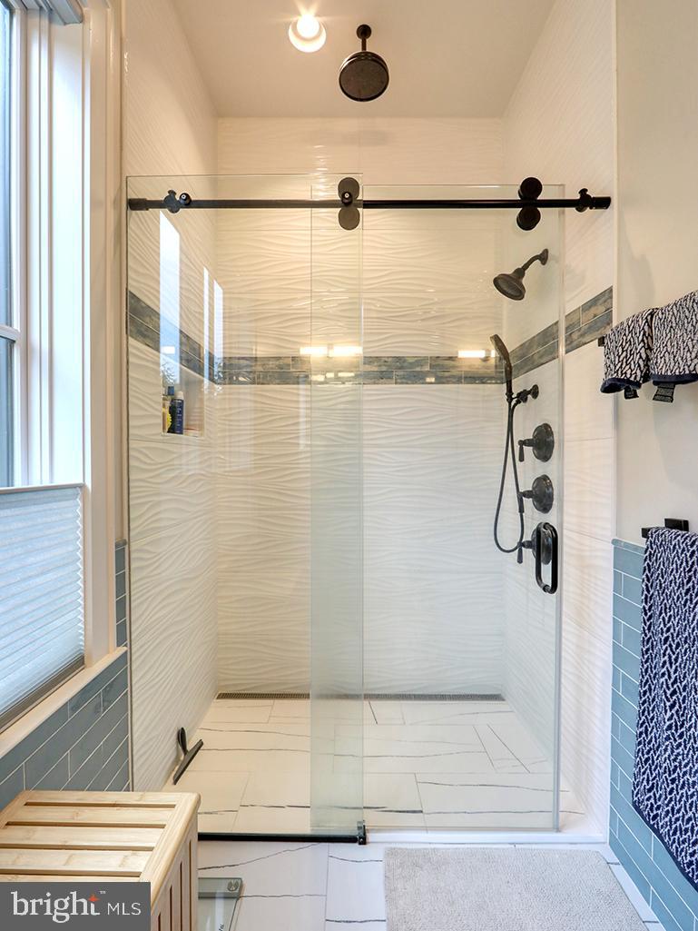 35975 Goshawk Court Lewes, DE 19958 - Photo 36 of 94 a bathroom with a shower and a shower
