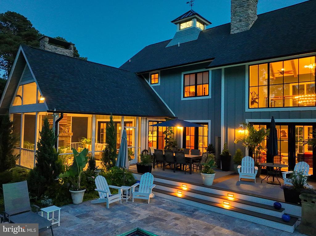 35975 Goshawk Court Lewes, DE 19958 - Photo 78 of 94 a view of swimming pool with outdoor seating