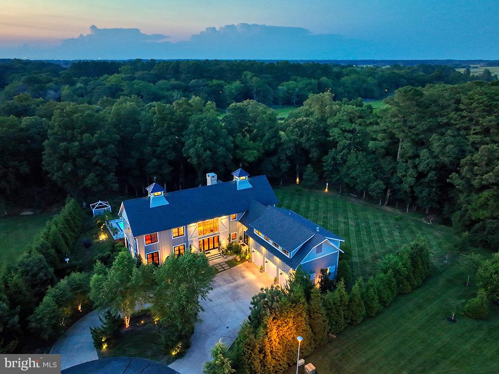35975 Goshawk Court Lewes, DE 19958 - Photo 84 of 94 an aerial view of a house with a garden