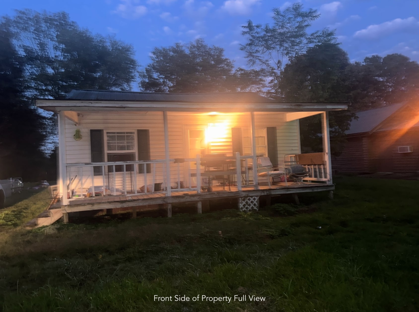 1047 Perry Switch Road Jackson, TN 38301 - Photo 14 of 36 a view of house with backyard and porch