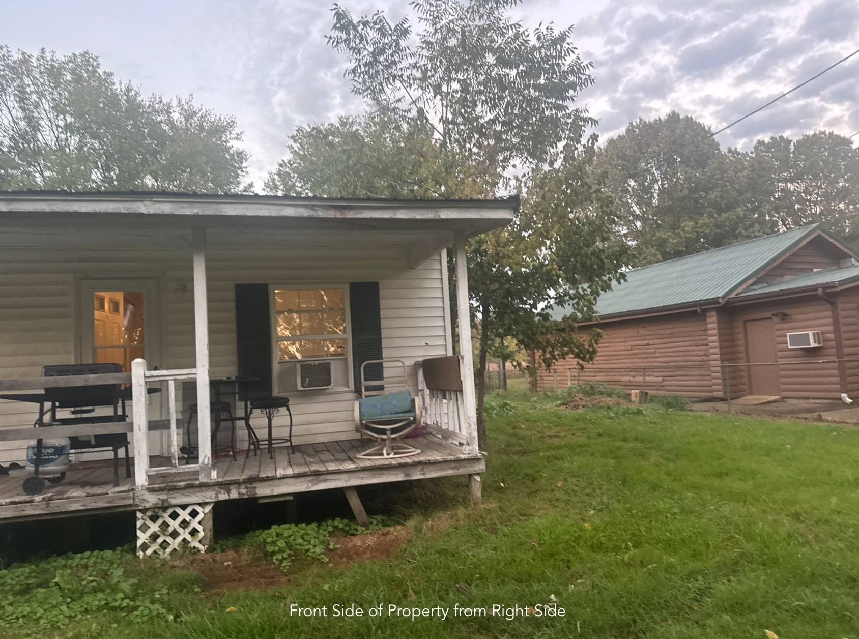 1047 Perry Switch Road Jackson, TN 38301 - Photo 9 of 36 a view of a house with backyard and sitting area