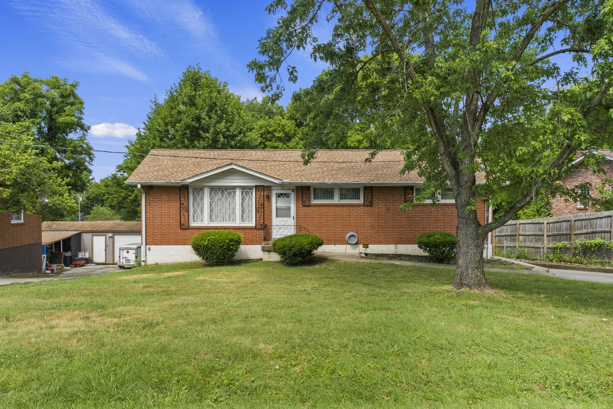 311 Bonnahurst Drive Hermitage, TN 37076 - Photo 2 of 47 front view of a house with a yard