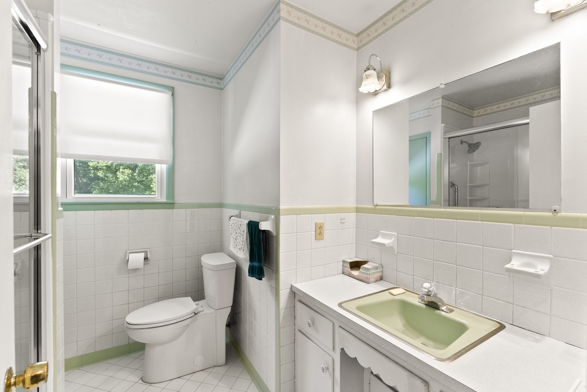 311 Bonnahurst Drive Hermitage, TN 37076 - Photo 21 of 47 a bathroom with a sink toilet and window