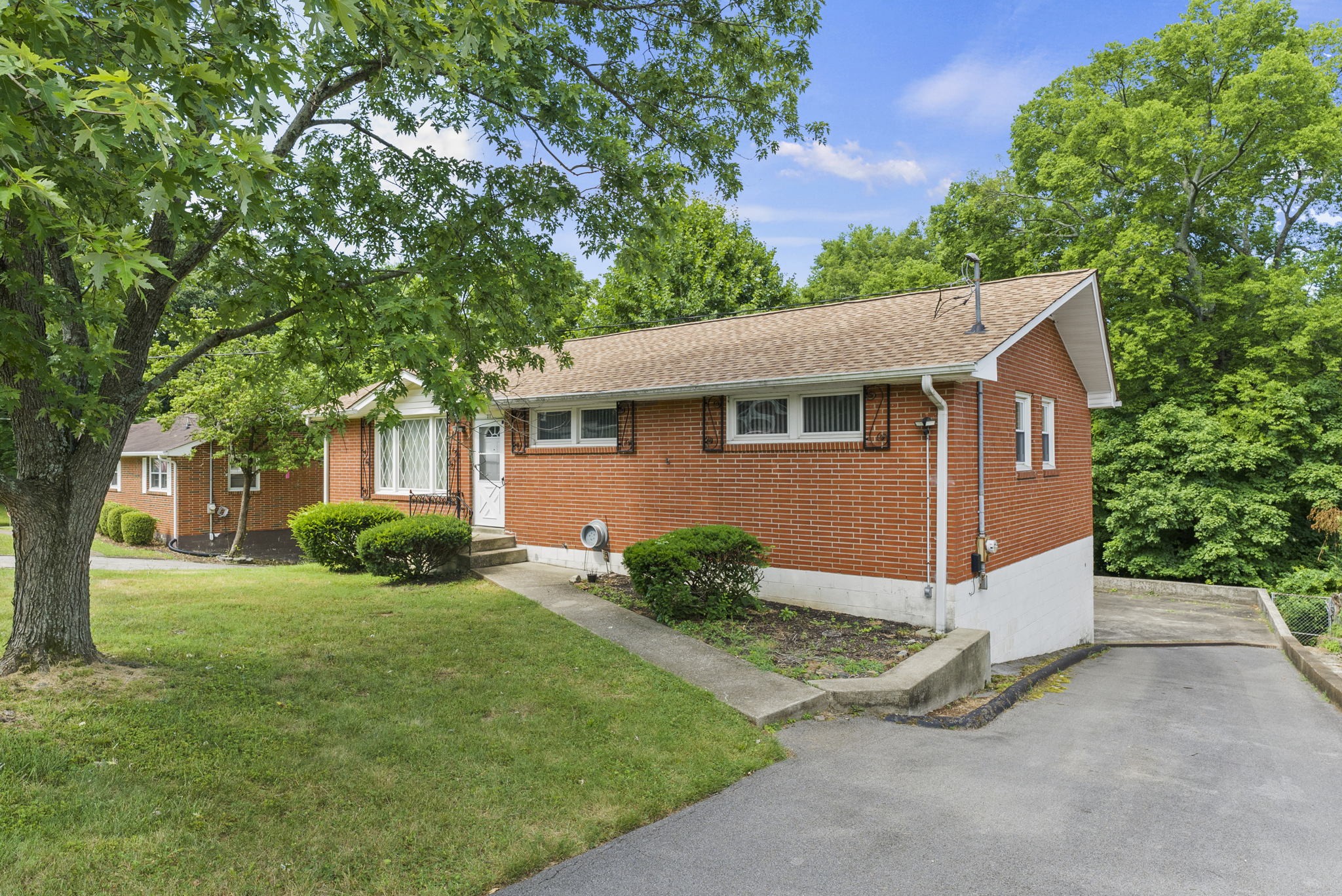 311 Bonnahurst Drive Hermitage, TN 37076 - Photo 5 of 47 a view of a house with a yard