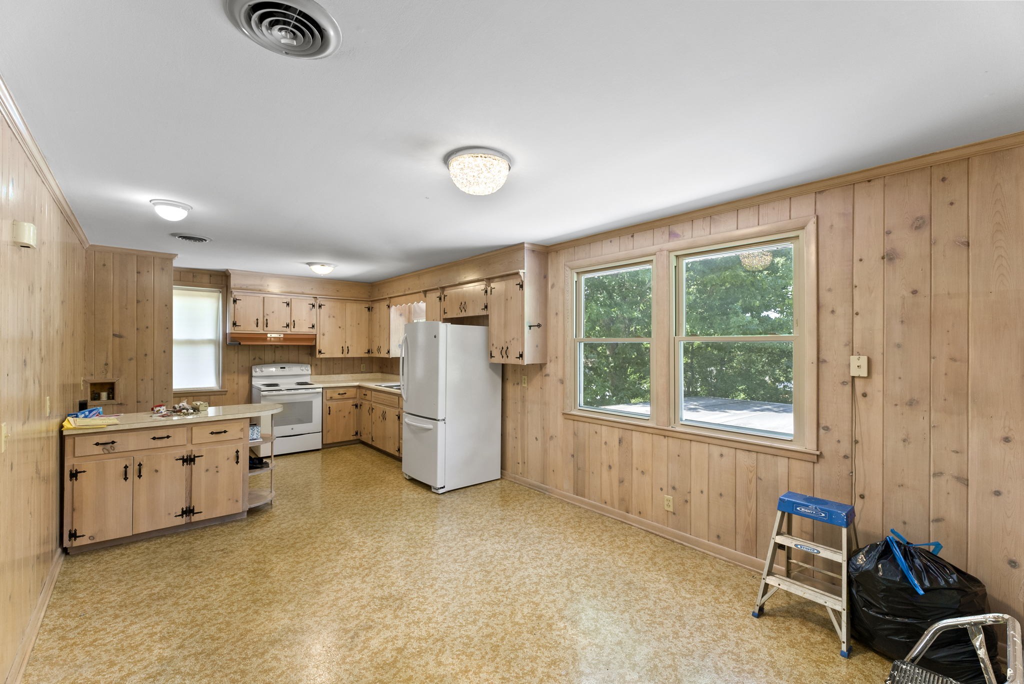 311 Bonnahurst Drive Hermitage, TN 37076 - Photo 7 of 47 a view of a kitchen with furniture and windows