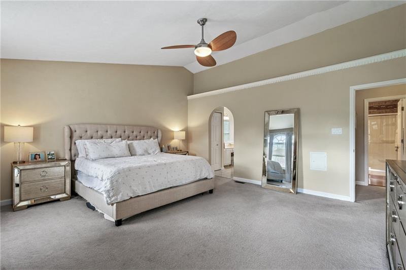 3013 Meyeridge Road Pittsburgh, PA 15209 - Photo 20 of 27 a spacious bedroom with a bed and large mirror