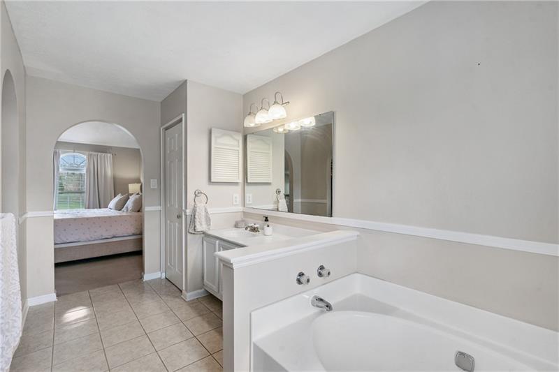 3013 Meyeridge Road Pittsburgh, PA 15209 - Photo 22 of 27 a bathroom with a tub sink and mirror