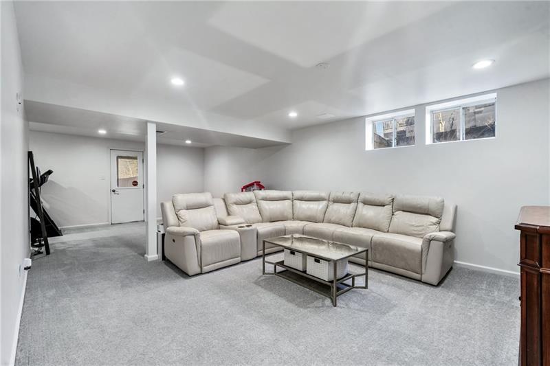 3013 Meyeridge Road Pittsburgh, PA 15209 - Photo 26 of 27 a living room with furniture and a flat screen tv