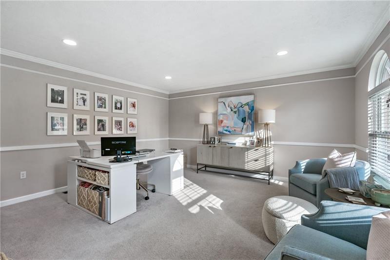 3013 Meyeridge Road Pittsburgh, PA 15209 - Photo 4 of 27 a living room with furniture a flat screen tv and a table