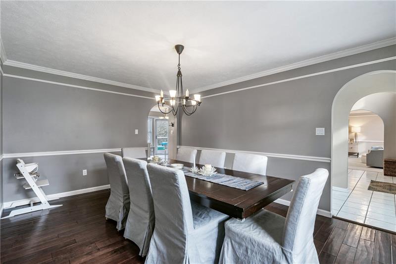 3013 Meyeridge Road Pittsburgh, PA 15209 - Photo 7 of 27 a view of a dining room with furniture wooden floor and chandelier