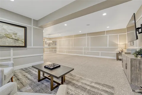 a room with furniture and a rug