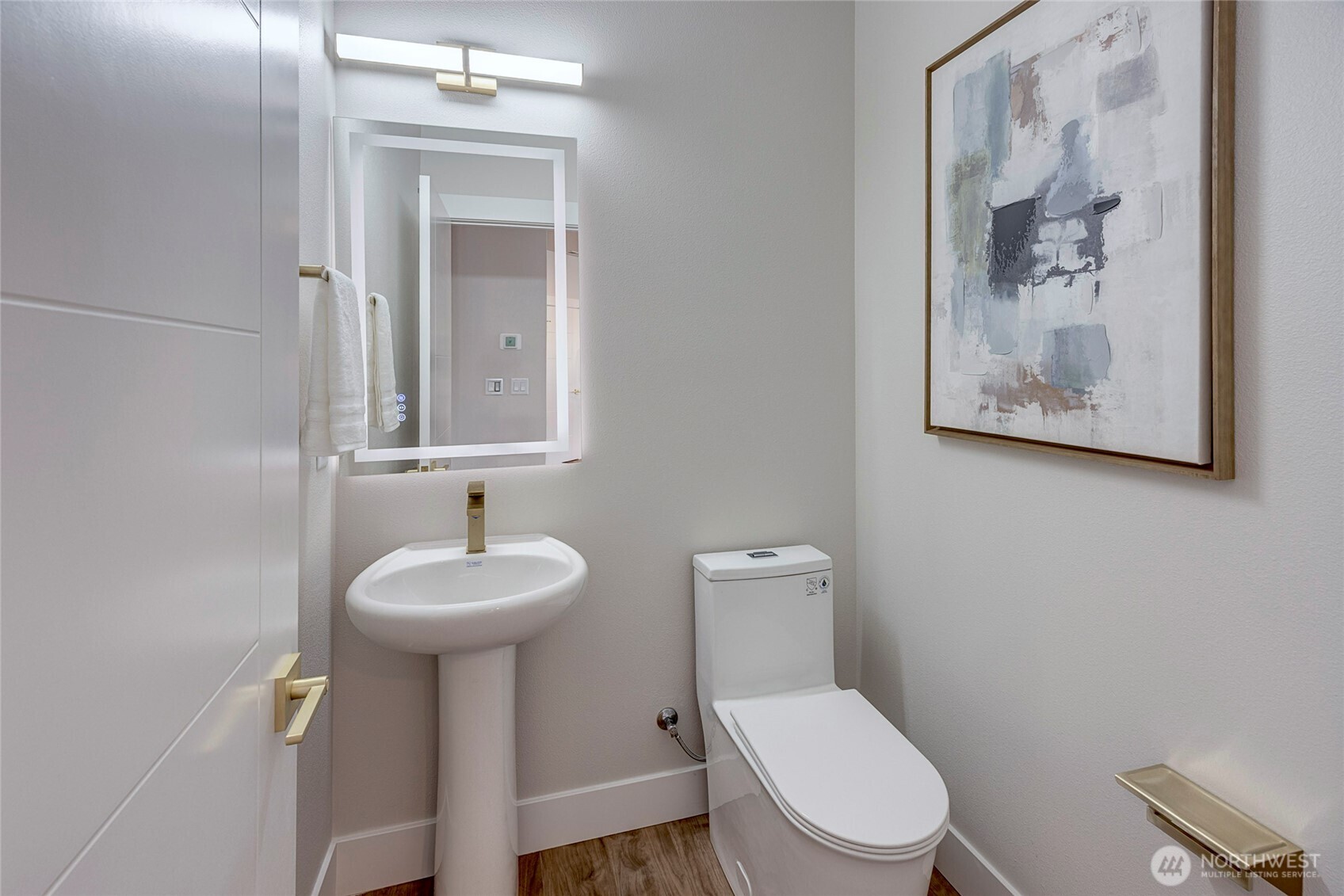 3928 214th Place Southeast, Unit B Bothell, WA 98021 - Photo 3 of 27 a bathroom with a toilet sink and mirror