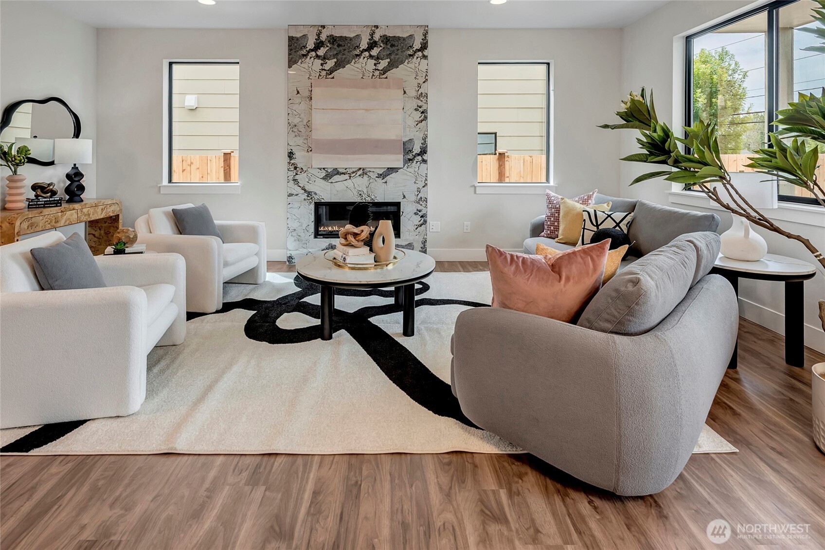 3928 214th Place Southeast, Unit B Bothell, WA 98021 - Photo 8 of 27 a living room with furniture and a fireplace