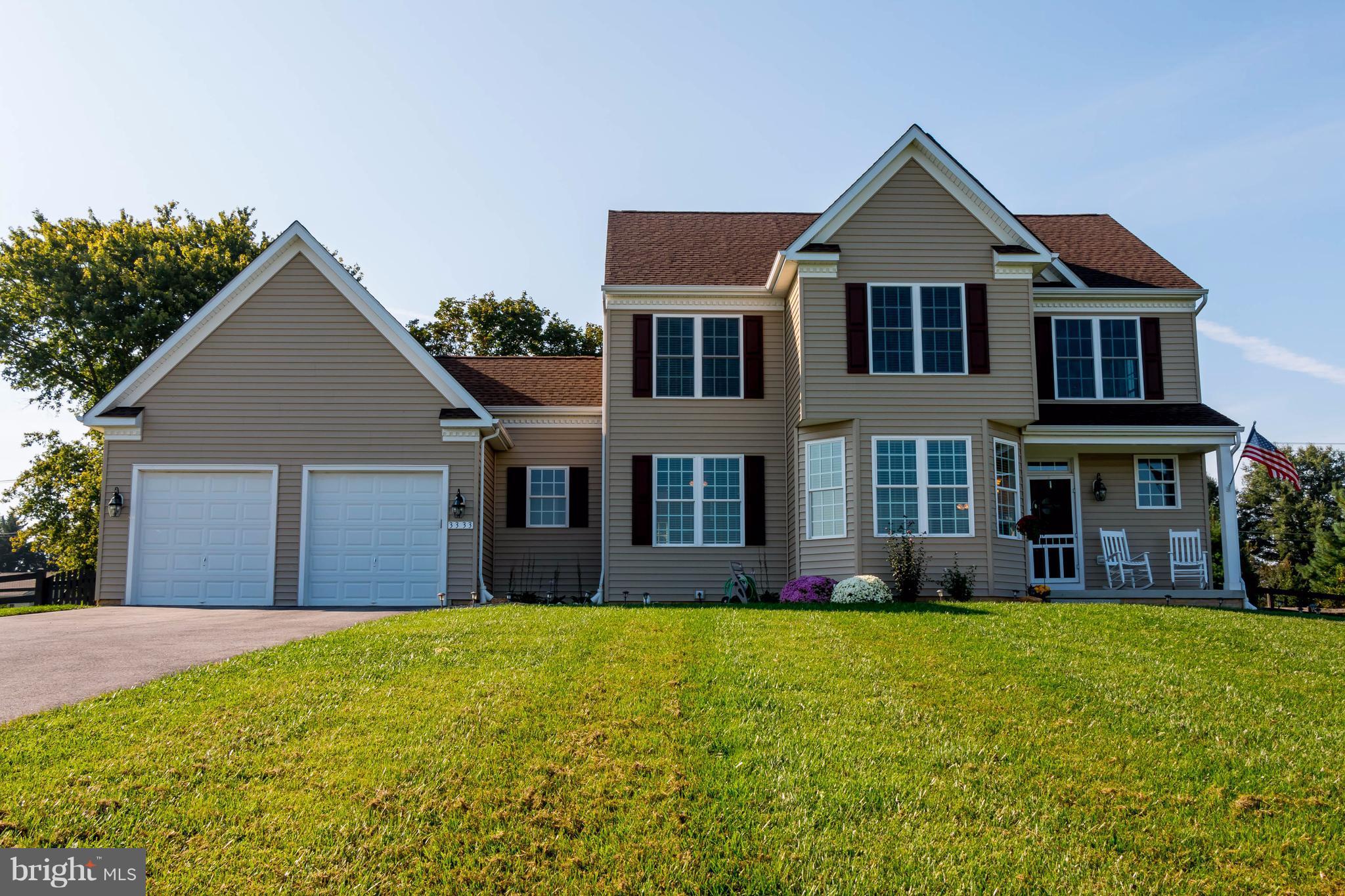 3333 Whispering Highland Road Finksburg, MD 21048 - Photo 1 of 30 a front view of a house with a yard