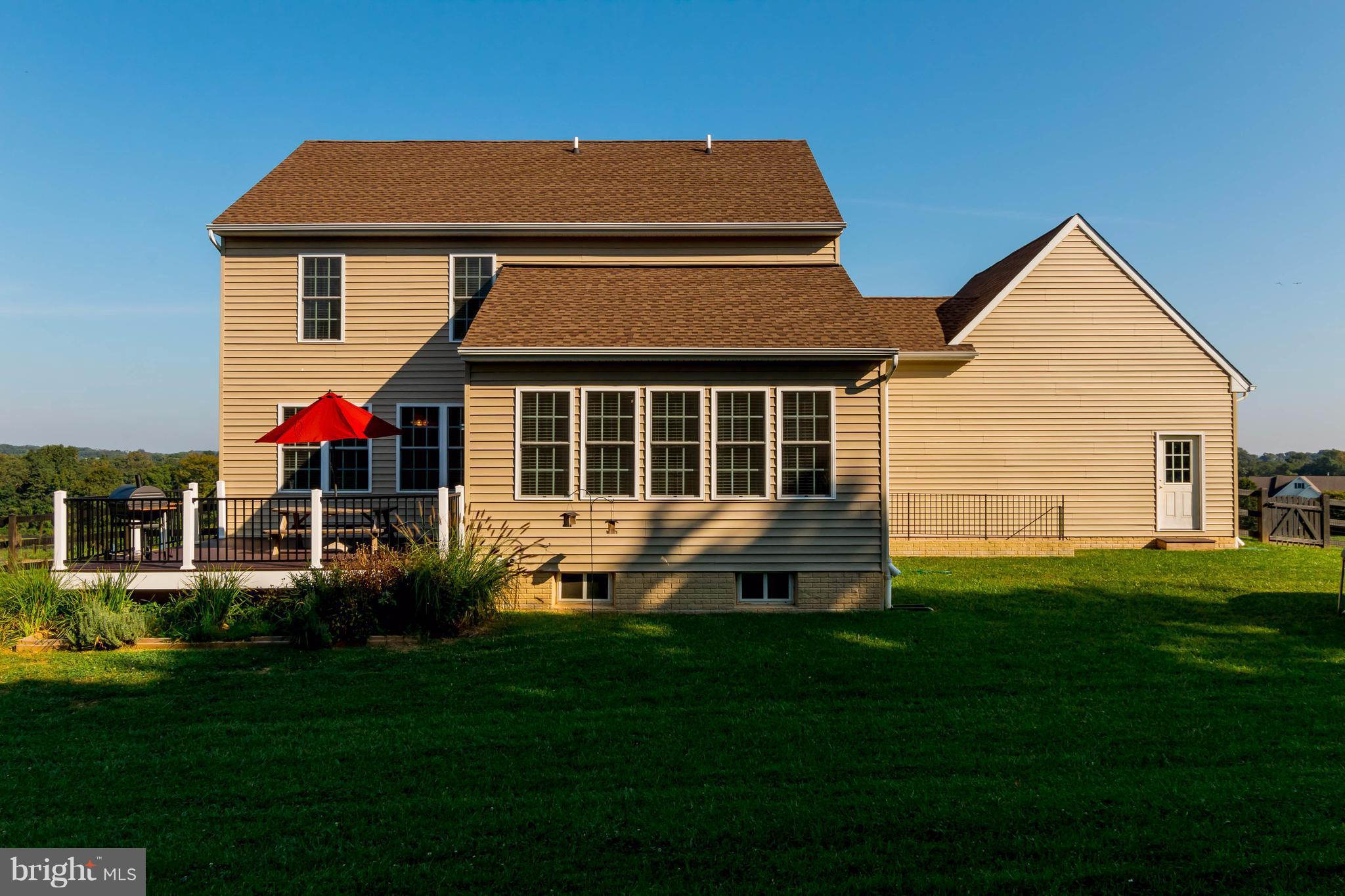 3333 Whispering Highland Road Finksburg, MD 21048 - Photo 25 of 30 a front view of a house with a yard