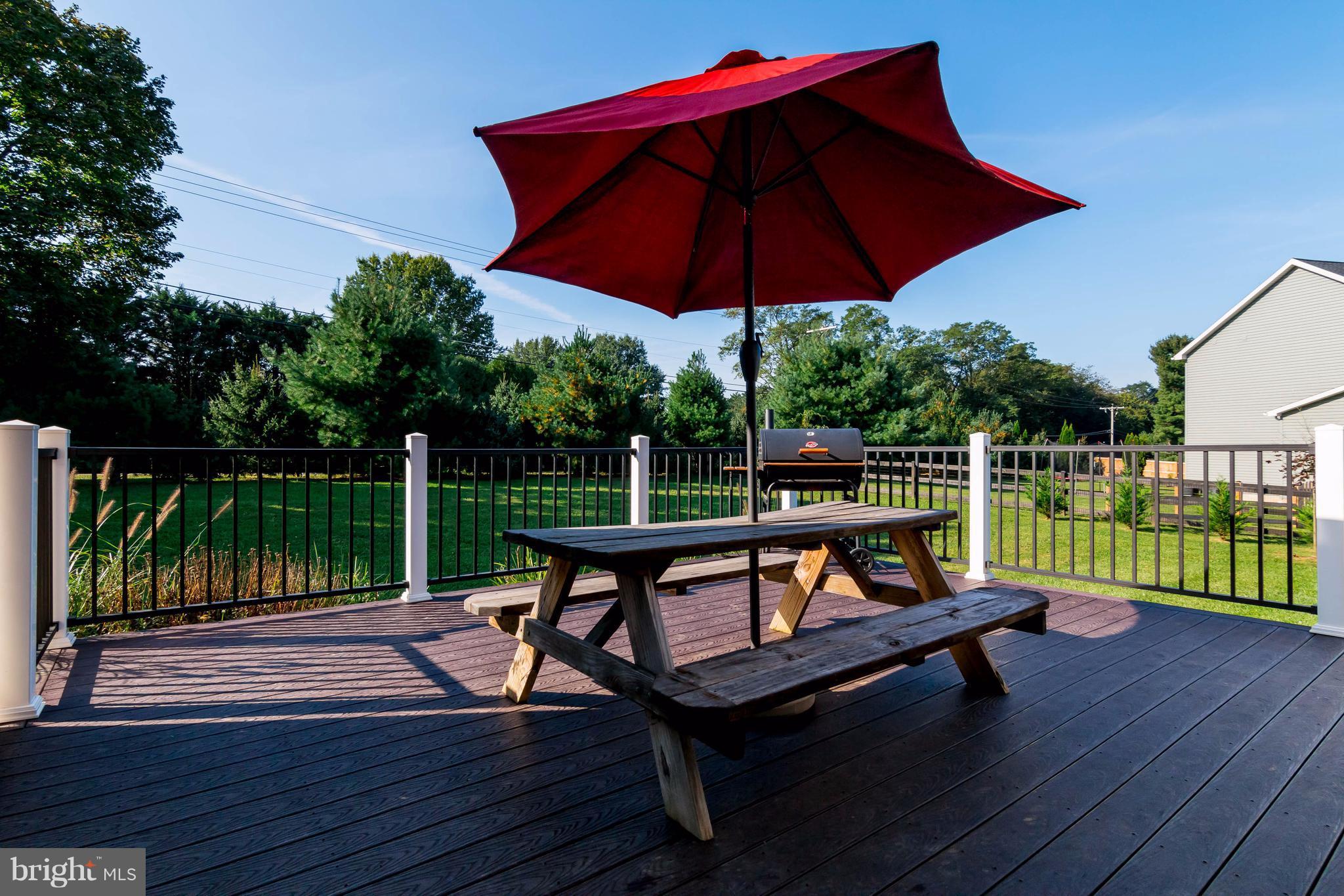 3333 Whispering Highland Road Finksburg, MD 21048 - Photo 29 of 30 a view of a wooden deck with furniture