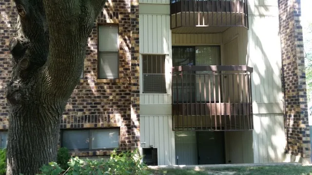a view of a house with a street