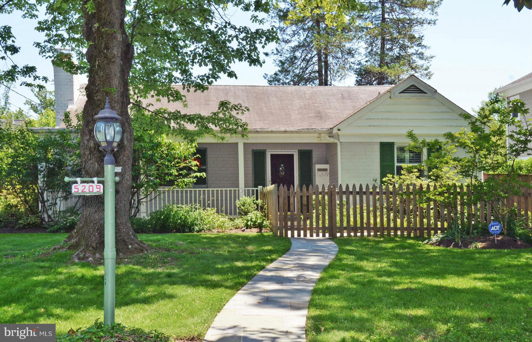 Generous set back from street,  slate walkways.