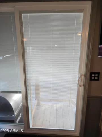 a view of an empty room with a fireplace