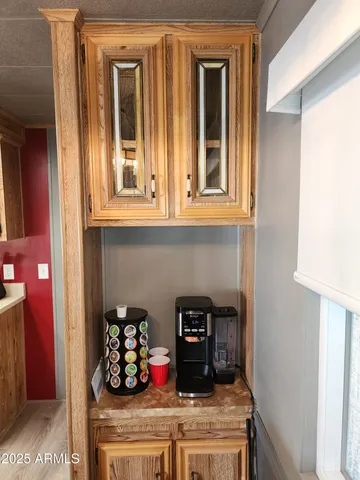 a kitchen with stainless steel appliances a stove microwave and cabinets