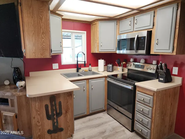 a kitchen with a stove and a cabinet