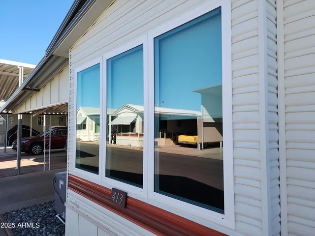 a view of living room with stainless steel appliances