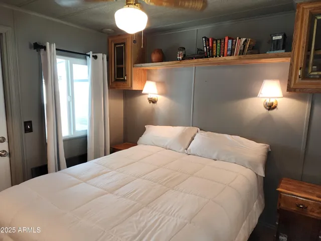 a view of a balcony with car parked