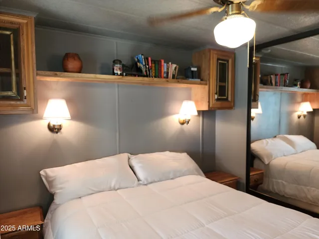 a view of a backyard with sitting area