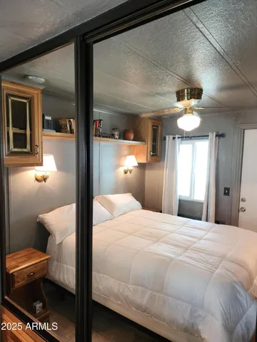 a backyard of a house with yard and outdoor seating