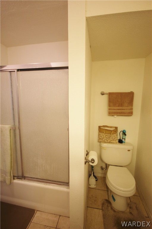 3408 Sunriver Road, Unit 109 Bullhead City, AZ 86429 - Photo 11 of 23 a bathroom with a toilet and a shower